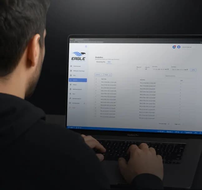 Developer monitoring automated CI/CD deployment pipeline for Unreal Engine applications through integrated DevOps workflows